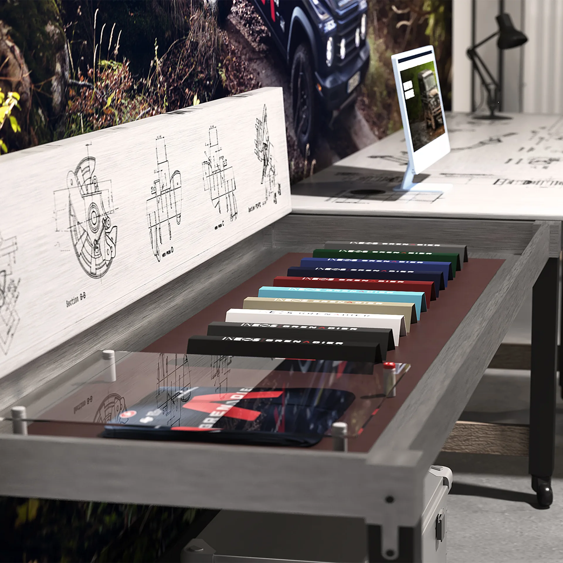 Material reference books displayed alongside architectural drawings