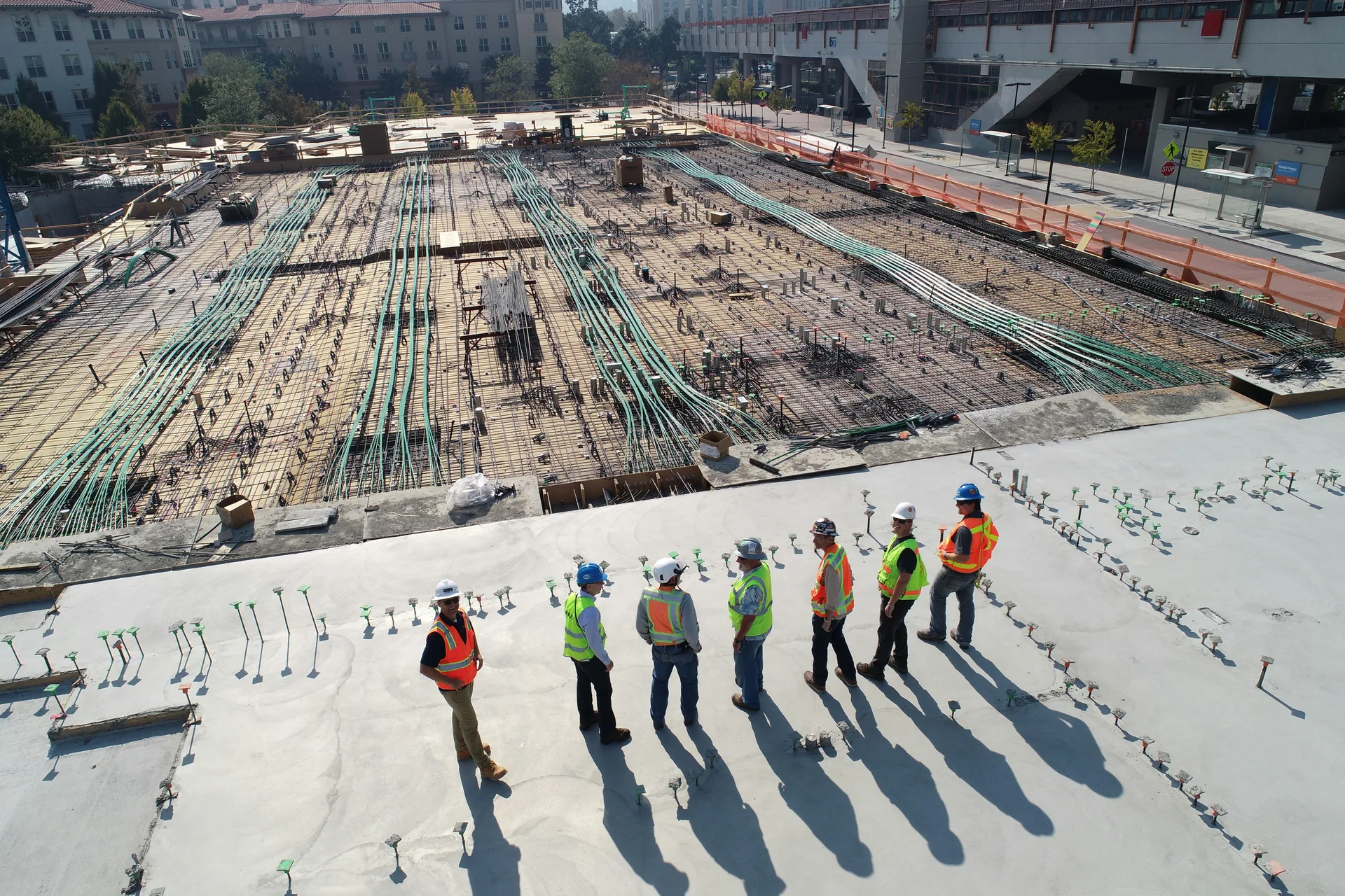 A project team discussing work on a construction site